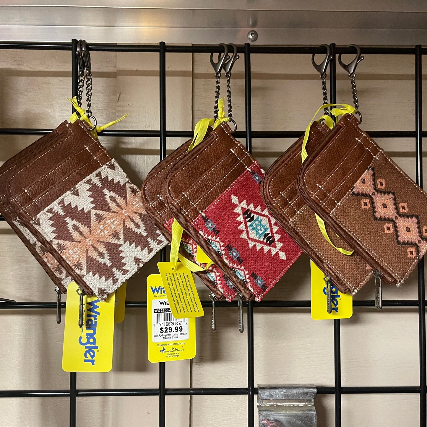 Slim card holder wallet with 2 slots on the side for card storage and a zipper along the edge for secure storage